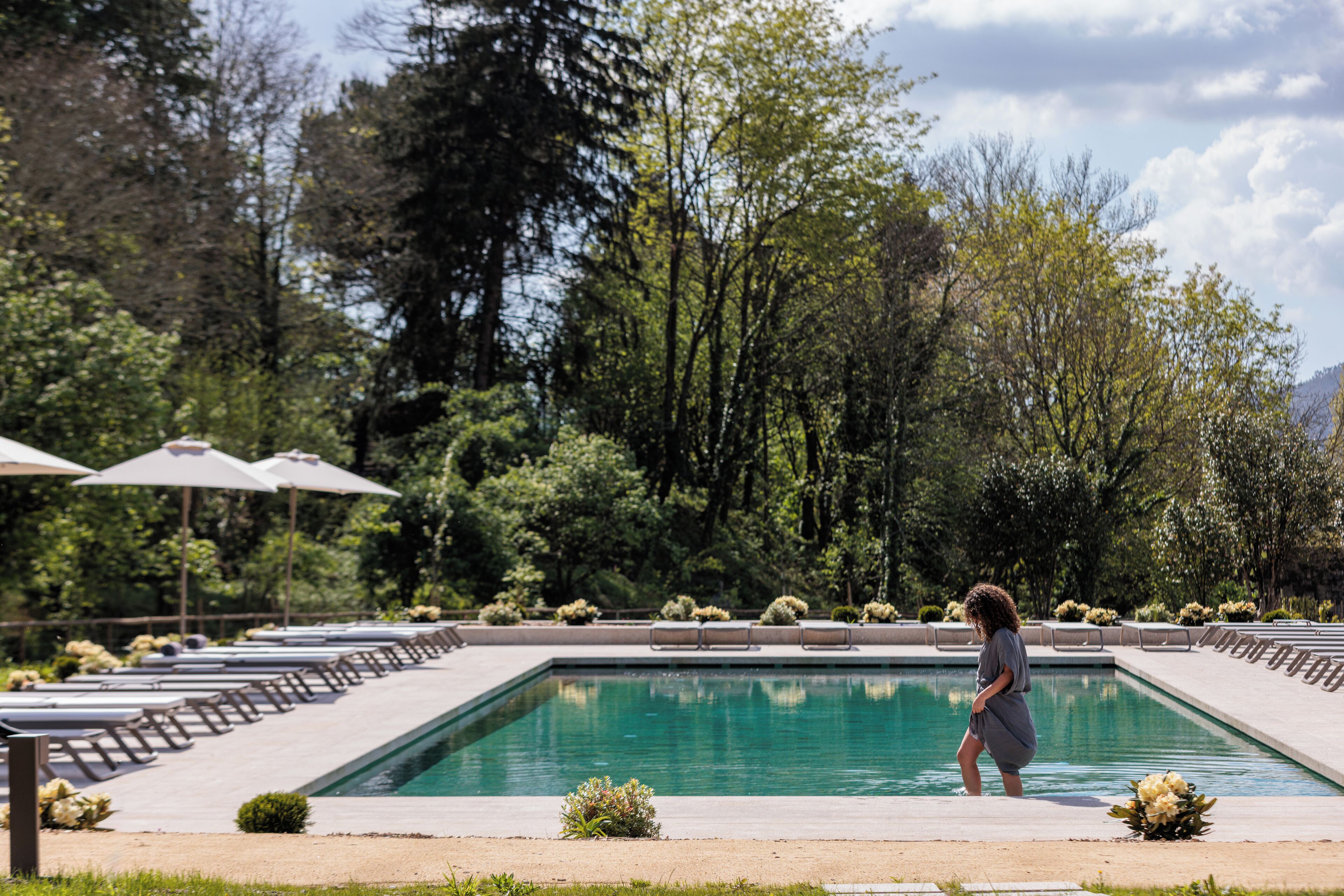 Indoor pool, seasonal outdoor pool, pool umbrellas, pool loungers