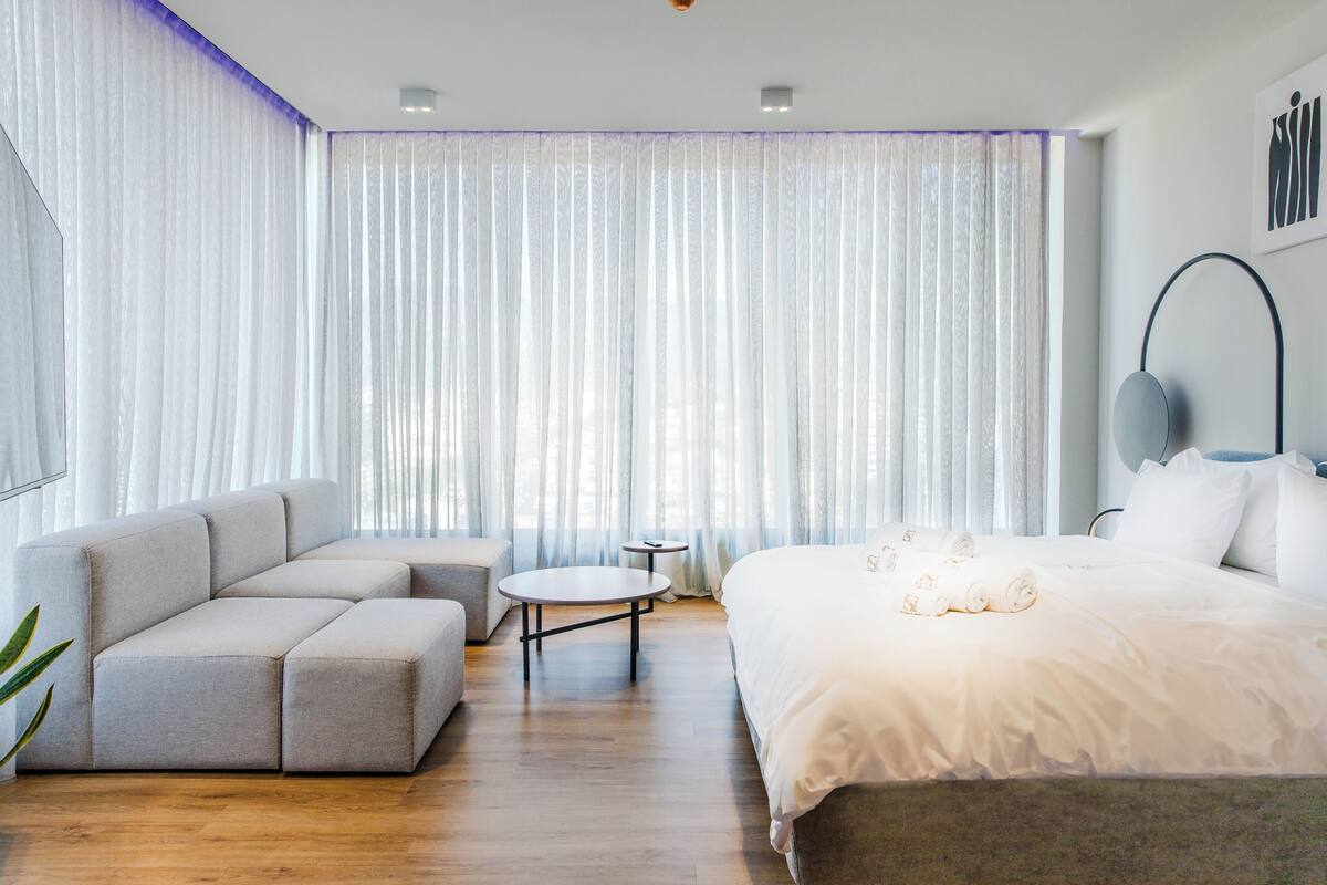 Suite estudio junior, vista a la ciudad | 1 habitación, sábanas de algodón egipcio y ropa de cama de alta calidad