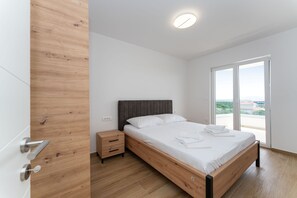 Apartment, 2 Bedrooms, Balcony, Garden View | 4 bedrooms