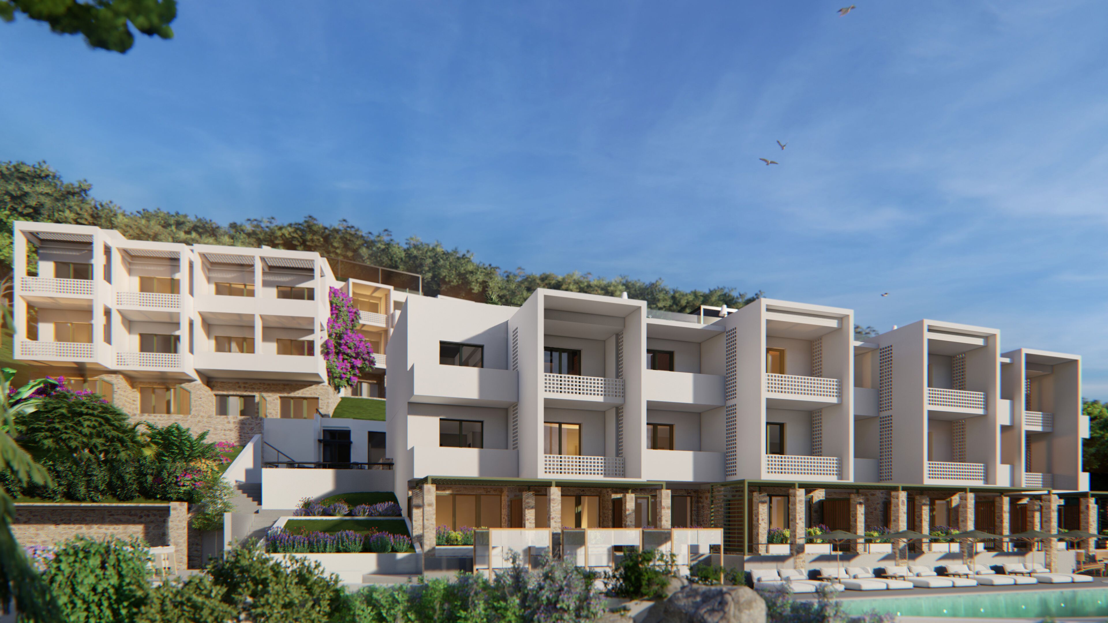 A modern hotel with multiple balconies, a swimming pool, and lush landscaping.