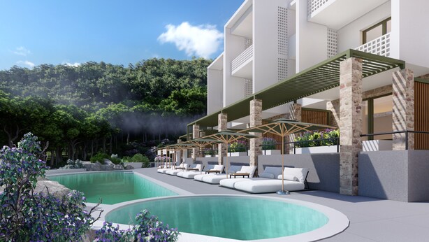 Un hotel moderno con piscina, mobiliario exterior y vistas al bosque circundante.