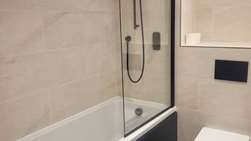 Shower, towels, toilet paper
