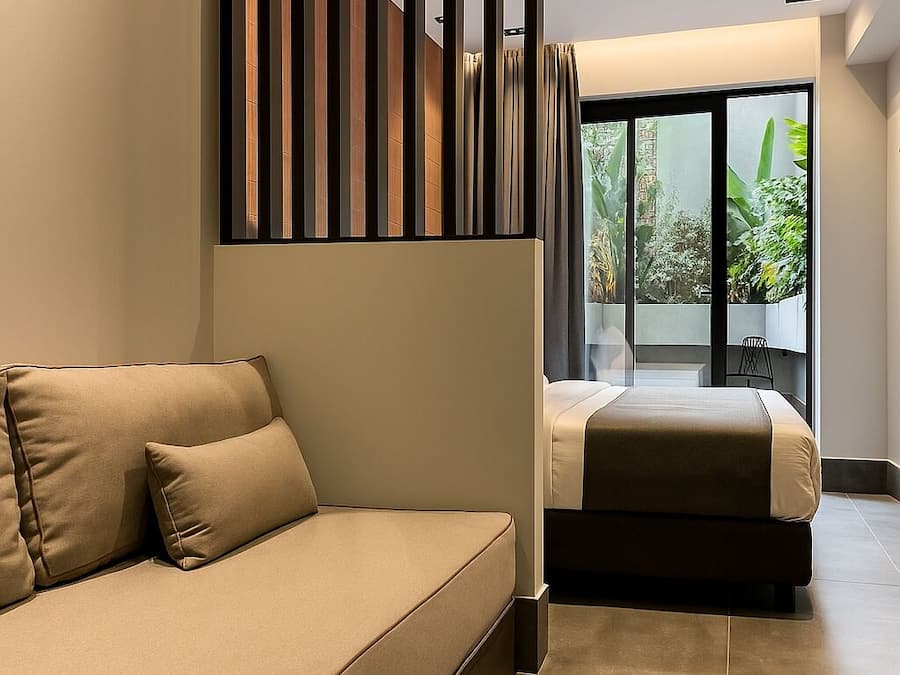 Junior Urban Garden Suite | Cortinas blackout, Wi-Fi de cortesia, roupa de cama