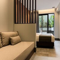 Junior Urban Garden Suite | Cortinas blackout, Wi-Fi de cortesia, roupa de cama