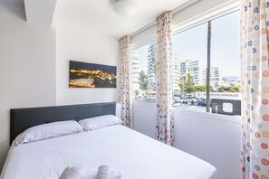 Iron/ironing board, bed sheets