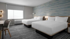 A hotel room with two beds, a desk, a chair, and a large window. - Towneplace Suites By Marriott Nampa (Nampa)