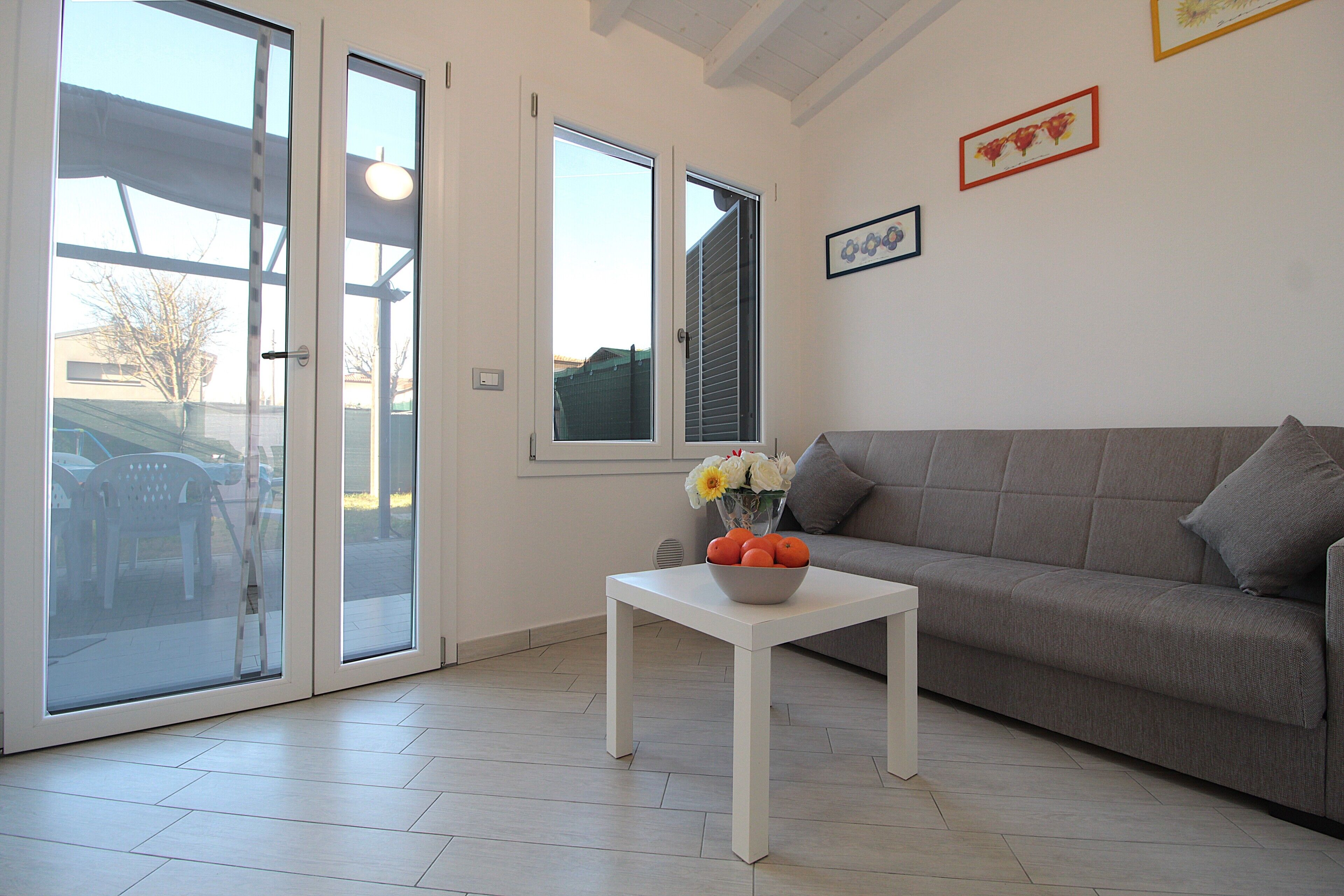 House, Balcony, Garden View | Living area | 32-inch flat-screen TV with cable channels