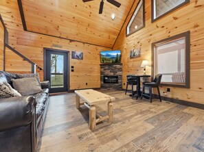 TV, fireplace, table football - Fly High in Gatlinburg - 3BR Cabin with Hot Tub & Rustic Elegance! (Gatlinburg)
