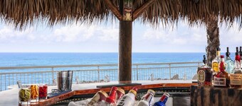 Cozy Condo with Direct access to our Beautiful Beach, Tiki Bar and Heated Pools!