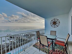 Outdoor dining - 1BD/1BA Gulf-Front Condo w. Hallway Bunk, Beachfront Pool, Gym + More (Perdido Key)