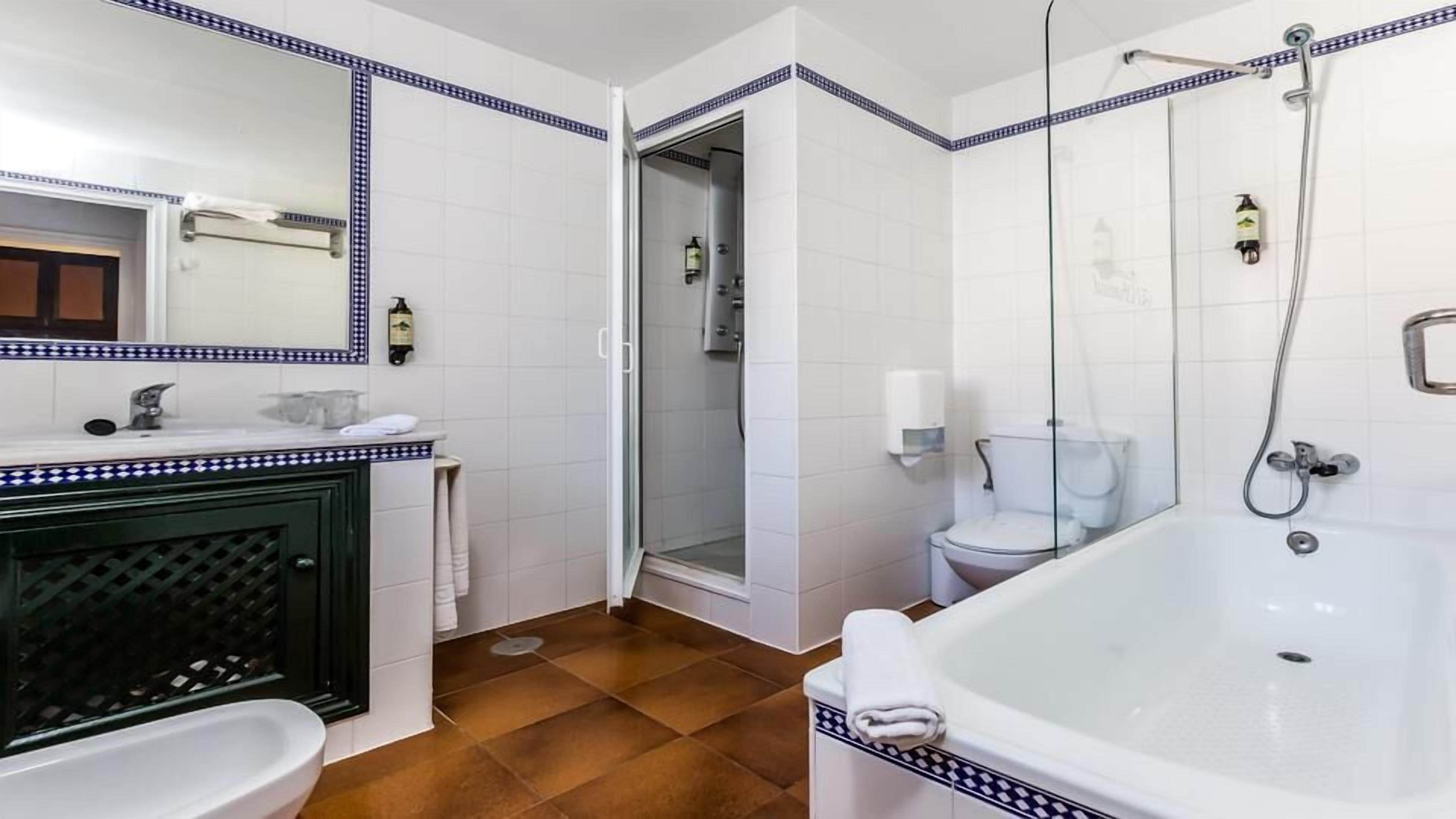 Classic Suite, Hill View | Bathroom | Combined shower/tub, hair dryer, towels, soap