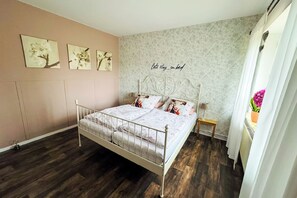 1 bedroom, desk, iron/ironing board, travel cot