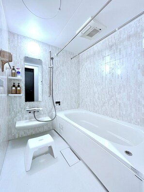 Hair dryer, bidet, towels, soap