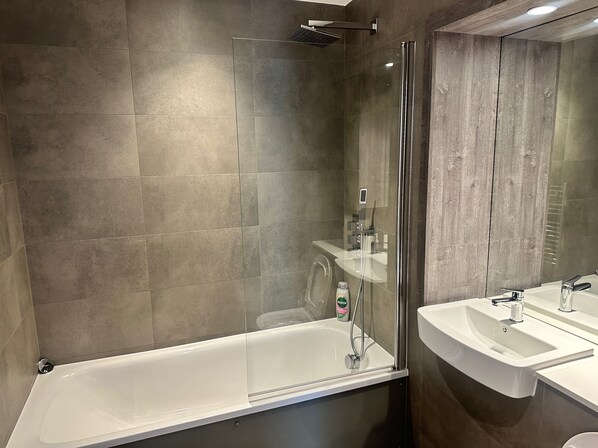 Separate tub and shower, deep soaking tub, towels