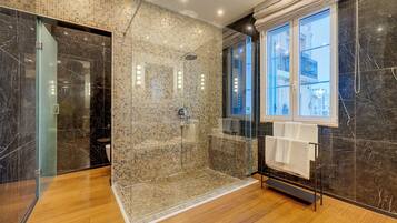 Shower, hair dryer, towels, soap