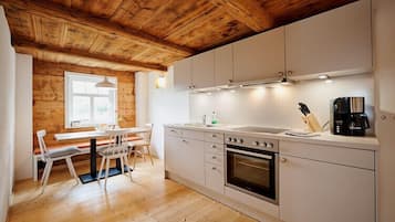 Superior Condo | Private kitchen | Full-size fridge, oven, stovetop, dishwasher