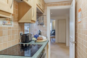 Fridge, microwave, oven, cookware/dishes/utensils