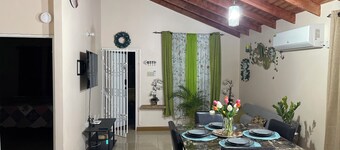 Charming gated 2-bedroom house with WiFi, AC,  and spacious yard
