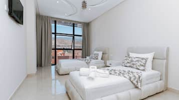 3 bedrooms, blackout curtains, soundproofing, iron/ironing board