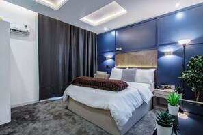 Deluxe Single Room | Premium bedding, iron/ironing board, free WiFi, bed sheets - Wallgate Apartments (Abuja)