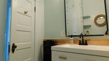 Eco-friendly toiletries, hair dryer, towels, soap