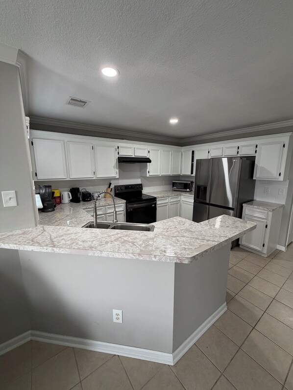 Unclassified image, 1 of 25, button