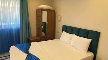 Classic Twin Room, City View | Iron/ironing board