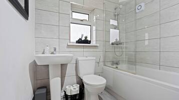 Hair dryer, towels, soap, toilet paper