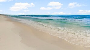 A beach with clear skies and waves. - Tango Vista With Pool, Elevator, And Beach Views (Miramar Beach)