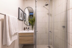 Shower, hair dryer, towels, soap - Metropolis Studio Apt  Wifi  Netflix (Cape Town)