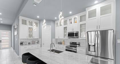 Spacious 4-bedroom house in fabulous Dallas with WiFi, AC