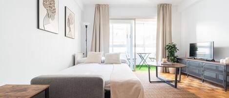 Tabla de planchar con plancha, wifi gratis, ropa de cama