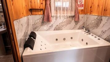 Wooden Jacuzzi Room | Bathroom | Shower, hair dryer, slippers, towels