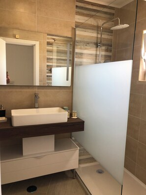 Hair dryer, towels, soap, shampoo