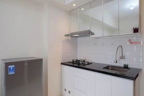 Standard Apartment, 1 Bedroom (Apartment) | Private kitchen - Modern Look 2BR at Podomoro Golf View Apartment (Gunung Putri)