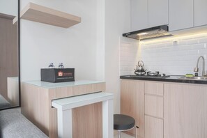 Standard Apartment, 2 Bedrooms (Apartment) | Private kitchen - Homey and Minimalist 2BR at Podomoro Golf View Apartment (Gunung Putri)