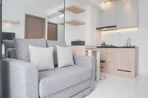 Interior - Homey and Minimalist 2BR at Podomoro Golf View Apartment (Gunung Putri)