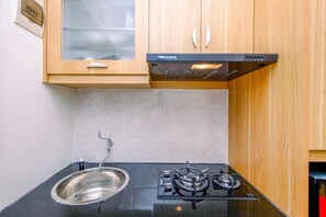 Standard Studio, 1 Bedroom (Apartment) | Private kitchen - Nice and Comfort Studio at 25th Floor Podomoro Golf View Apartment (Gunung Putri)