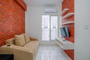 Standard Apartment, 1 Bedroom (Apartment) | Living area - Cozy Stay 2BR at Podomoro Golf View Apartment (Gunung Putri)