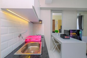 Standard Apartment, 1 Bedroom (Apartment) | Private kitchen | Fridge, rice cooker - Best Deal and Tidy 2BR Podomoro Golf View Apartment (Gunung Putri)