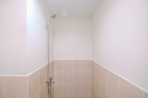 Standard Studio, 1 Bedroom (Apartment) | Bathroom | Shower, free toiletries, towels - Enjoy Living at Studio Apartment Podomoro Golf View (Gunung Putri)