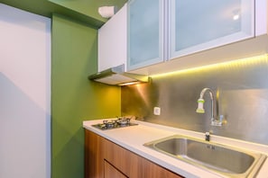 Private kitchen - Nice and Elegant 2BR at Podomoro Golf View Apartment (Gunung Putri)