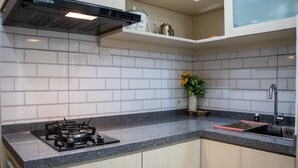 Unclassified image, 2 of 18, button - Well Furnished 2BR at Podomoro Golf View Apartment (Gunung Putri)