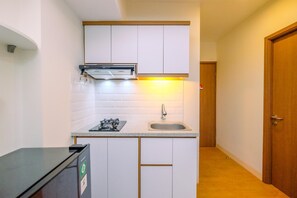 Standard Apartment, 1 Bedroom (Apartment) | Private kitchen | Fridge, rice cooker - Homey and Restful 2BR Podomoro Golf View Apartment (Gunung Putri)