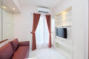 Living area - Comfort 2BR at 15th Floor Podomoro Golf View Apartment (Gunung Putri)