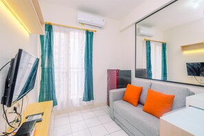 Living area - Best Deal and and Cozy 2BR Podomoro Golf View Apartment (Gunung Putri)