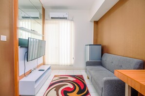 Living area - Minimalist 1BR with Extra Room Podomoro Golf View Apartment (Gunung Putri)