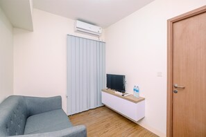 Living area - Warm and Simply Look 2BR at Podomoro Golf View Apartment (Gunung Putri)