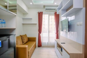 Living area - Comfortable and Tidy 2BR Podomoro Golf View Apartment (Gunung Putri)