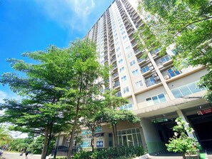 Exterior - Warm and Homey 2BR at Podomoro Golf View Apartment (Gunung Putri)